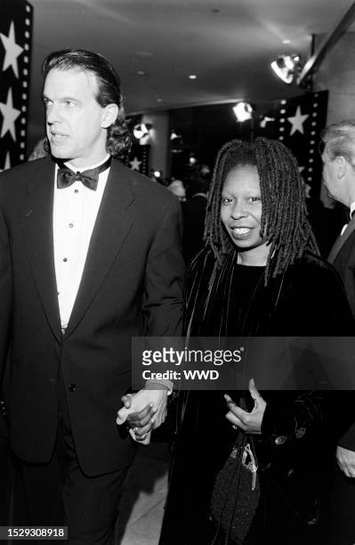 Lyle Trachtenberg and Whoopi Goldberg attend an event at the Beverly Hilton Hotel in Beverly Hills, California, on March 2, 1995.