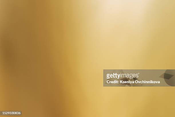 shiny yellow leaf gold foil texture background - messing stock-fotos und bilder