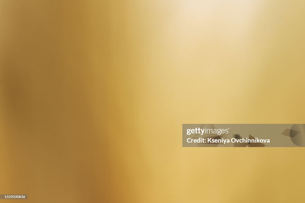 Shiny yellow leaf gold foil texture background