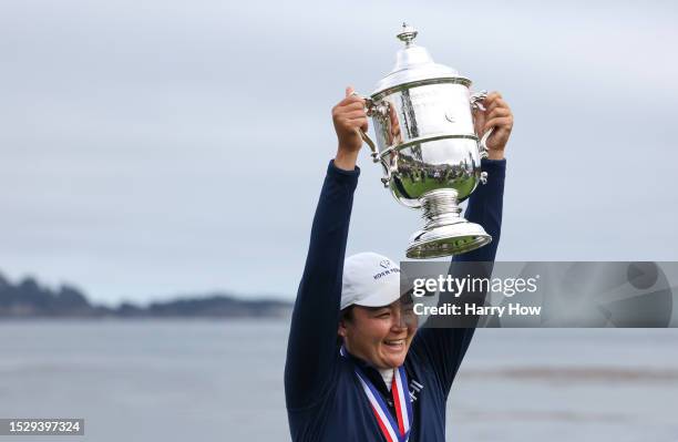 Allisen Corpuz of the United States celebrates with the Harton S. Semple Trophy after winning the 78th U.S. Women's Open at Pebble Beach Golf Links...