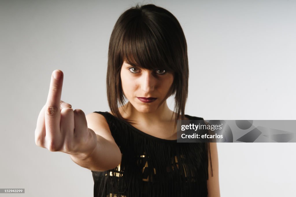 Attractive female making obscene gesture