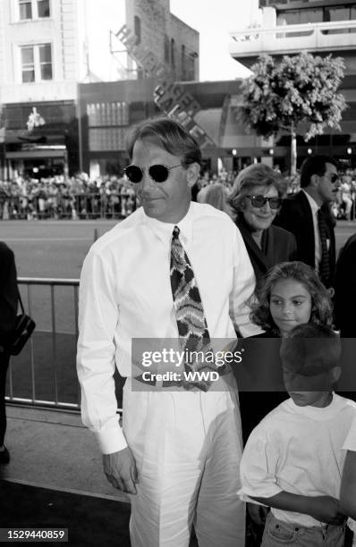 Kevin Costner, Annie Costner, and Joe Costner attend the Los Angeles premiere of "Waterworld" at the headquarters of the Academy of Motion Picture...