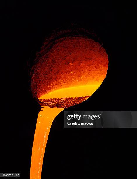 poured molten metal - molten stock pictures, royalty-free photos & images