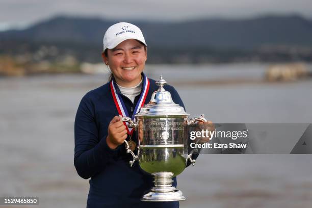 Allisen Corpuz of the United States celebrates with the Harton S. Semple Trophy after winning the 78th U.S. Women's Open at Pebble Beach Golf Links...