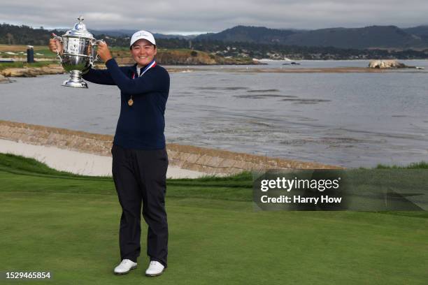 Allisen Corpuz of the United States celebrates with the Harton S. Semple Trophy after winning the 78th U.S. Women's Open at Pebble Beach Golf Links...