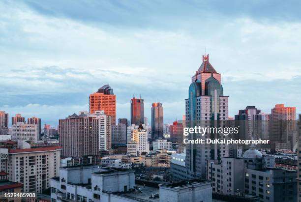 urumqi skyline night , xinjiang province china - urumqi stock pictures, royalty-free photos & images