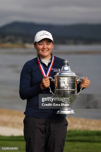 Allisen Corpuz of the United States celebrates with the Harton S. Semple Trophy after winning the 78th U.S. Women's Open at Pebble Beach Golf Links...