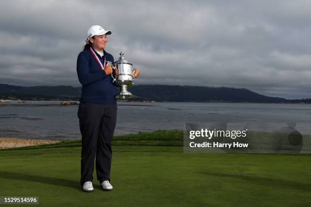 Allisen Corpuz of the United States celebrates with the Harton S. Semple Trophy after winning the 78th U.S. Women's Open at Pebble Beach Golf Links...