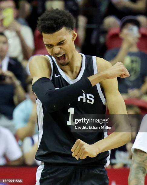 Victor Wembanyama of the San Antonio Spurs celebrates after the Spurs forced a shot-clock violation against the Portland Trail Blazers in the second...