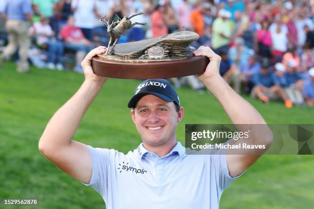 Sepp Straka of Austria poses with the trophy after winning the John Deere Classic at TPC Deere Run on July 09, 2023 in Silvis, Illinois.