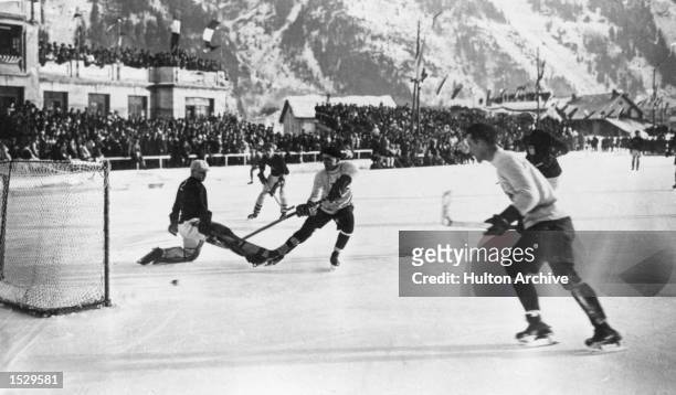 The Winter Olympics, Chamonix. The Canadian ice hockey team, the Toronto Granites, scoring during the final in which they beat the United States in...