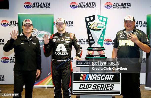 William Byron, driver of the Axalta Chevrolet, celebrates with Jeff Gordon, Vice Chairman of Hendrick Motorsports and William Byron, driver of the...