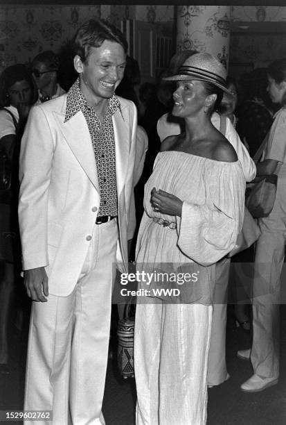 Bob Mackie and guests attend the Cole of California Beach and Beyond by Bob Mackie 1977 Swimwear Collection Hollywood gala-themed fashion show debut...