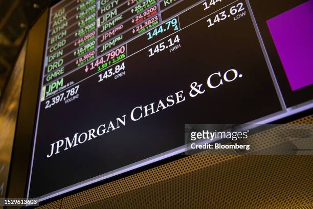 JPMorgan Chase signage is displayed on the floor of the New York Stock Exchange in New York, US, on Friday, July 7, 2023. JPMorgan Chase & Co. Is...