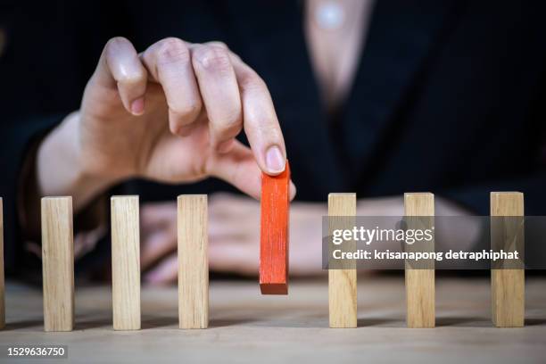 strategy and planing concept idea.,domino,wooden block,business risk - value chain stock pictures, royalty-free photos & images