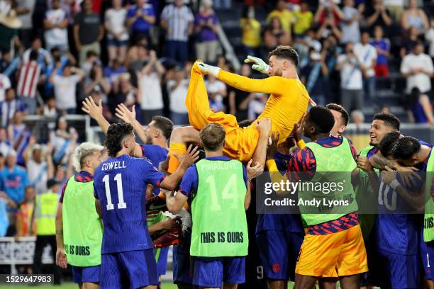 Matt Turner of the United States celebrates with teammates after defeating Canada in apenalty shoot out in the Quarterfinal match in the 2023...