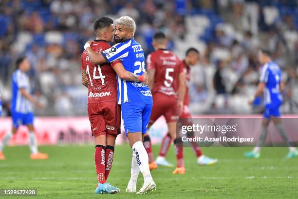 Rodrigo Aguirre of Monterrey and Luis Reyes of Atlas hug after the 2nd round match between Monterrey and Atlas as part of the Torneo Apertura 2023...