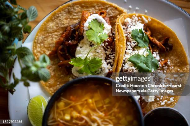 Lion's Tinga with a Fideo soup bowl at Cochinita & Co. Kitchen.