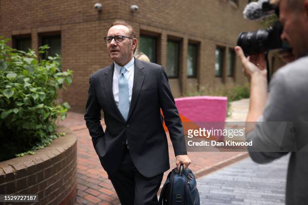 Kevin Spacey leaves after giving evidence at his sexual assault trial at Southwark Crown Court on July 13, 2023 in London, England. The US actor is...
