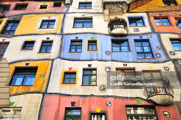 colourful facade of the hundertwasser house, hundertwasserhaus, vienna, austria - vienna stock pictures, royalty-free photos & images