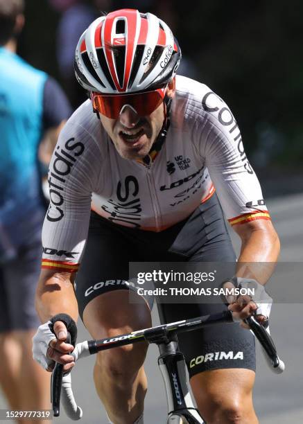 Cofidis' Spanish rider Ion Izaguirre Insausti cycles in a lone breakaway in the final ascent of the Col de la Croix Rosier during the 12th stage of...