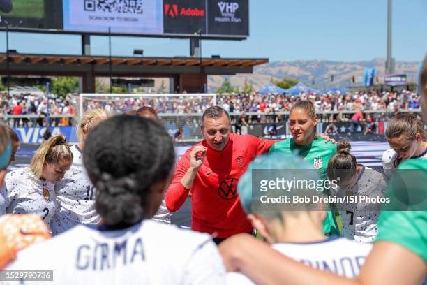 Head coach Vlatko Andonovski and his USWNT huddle and celebrate during an international friendly game between Wales and USWNT at PayPal Park on July...