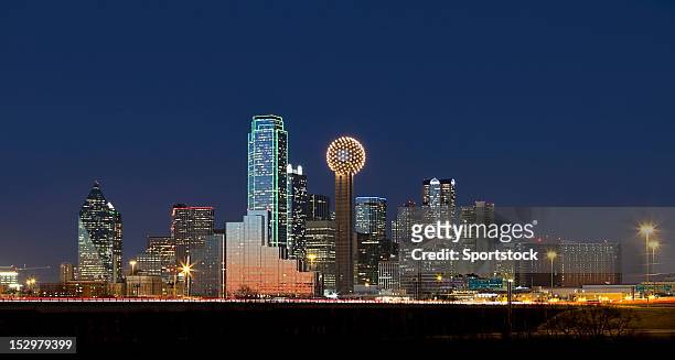 dallas, texas skyline at night - dallas texas bildbanksfoton och bilder