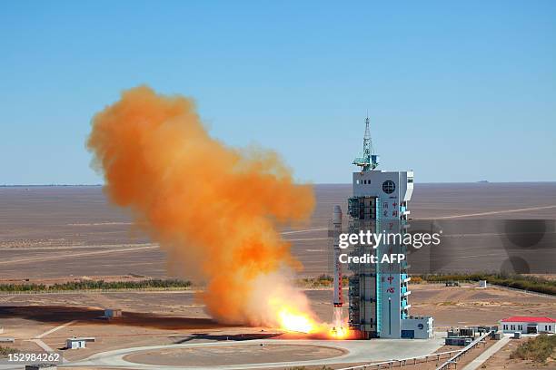 Chinese rocket takes off with the Venezuelan earth observation satellite Miranda from the remote Gobi desert in Jiuquan, northwest China's Gansu...