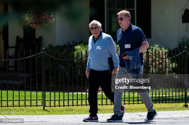 Robert Kraft, chief executive officer of Kraft Group, left, and Roger Goodell, commissioner of the National Football League , walk to lunch during...