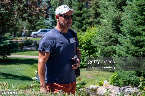 Mike Stone, chief investment officer of TPG Rise Funds, walks to lunch during the Allen & Co. Media and Technology Conference in Sun Valley, Idaho,...