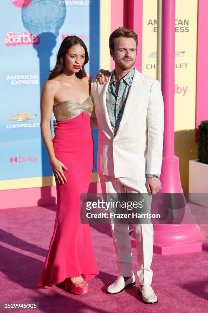 Finneas O'Connell and Claudia Sulewski attend the World Premiere of "Barbie" at Shrine Auditorium and Expo Hall on July 09, 2023 in Los Angeles,...