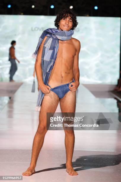 Model walks the runway for Love For Upcycling Show during Miami Swim Week The Shows at SLS South Beach on July 09, 2023 in Miami Beach, Florida.