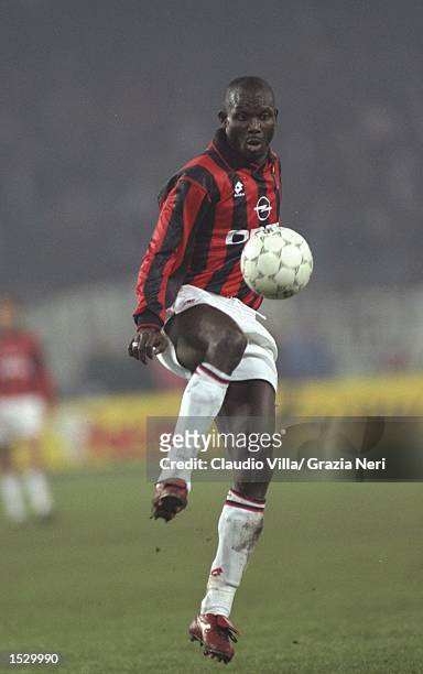 George Weah of AC Milan in action during the Serie A match against Juventus at the San Siro Stadium in Milan, Italy. Mandatory Credit: Claudio...