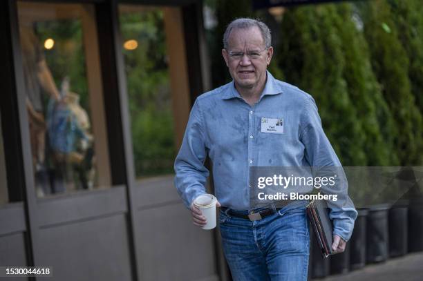 Ted Weschler, portfolio manager at Berkshire Hathaway Inc., walks to the morning session during the Allen & Co. Media and Technology Conference in...