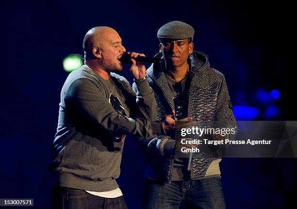 Kool Savas and Xavier Naidoo perform during the 'Bundesvision Song Contest 2012' at the Max-Schmeling-Halle on September 28, 2012 in Berlin, Germany.