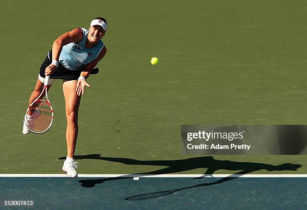 Nadia Petrova of Russia serves on her way to victory over Agnieszka Radwanska of Poland in the womens final during day seven of the Toray Pan Pacific...