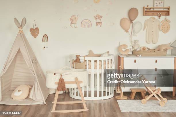 children's room. interior of nursery. scandinavian style. toys and development. - babyzimmer stock-fotos und bilder