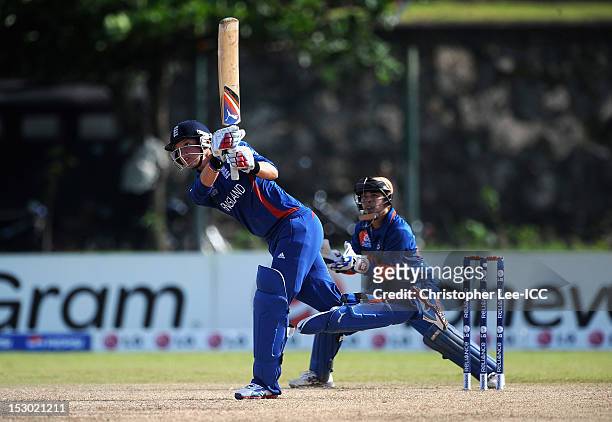 Sarah Taylor of England in action as Sulakshana Naik of India stands by the stumps during the ICC Women's World Twenty20 2012 Group A match between...
