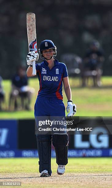 Charlotte Edwards of England salutes the crowd as she celebrates her 50 during the ICC Women's World Twenty20 2012 Group A match between England and...