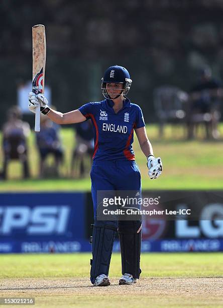 Charlotte Edwards of England salutes the crowd as she celebrates her 50 during the ICC Women's World Twenty20 2012 Group A match between England and...