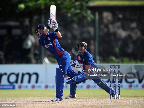 Sarah Taylor of England in action as Sulakshana Naik of India stands by the stumps during the ICC Women's World Twenty20 2012 Group A match between...