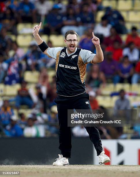 Daniel Vettori of New Zealand celebrates taking the wicket of Craig Kieswetter of England during the A1 versus B2 ICC World T20 Super Eight match...