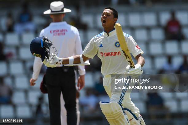 Yashasvi Jaiswal of India celebrates his century during day two of the First Test between West Indies and India at Windsor Park in Roseau, Dominica,...