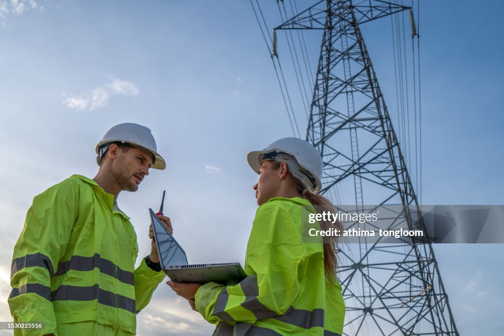 Electrician Team Report On High Voltage Transmission Lines Through A ...