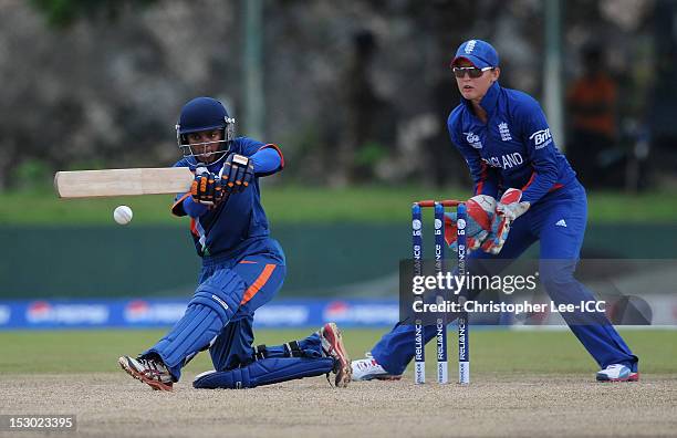 Poonam Raut of India in action as Sarah Taylor of England watches during the ICC Women's World Twenty20 2012 Group A match between England and India...