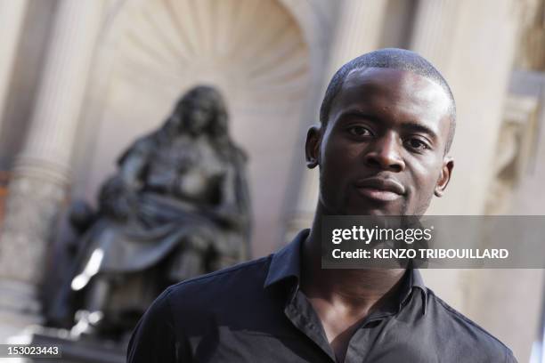 French Cameroonian-born student Jean Eyoum poses on September 29, 2012 in Paris. Eyoum wrote "super cagnotte" a street-talk version of Moliere's...