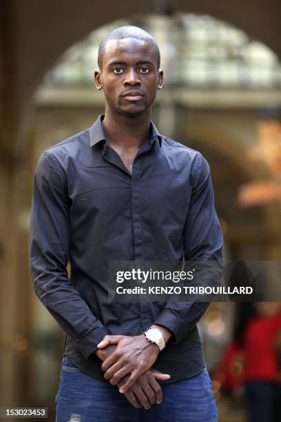French Cameroonian-born student Jean Eyoum poses on September 29, 2012 in Paris. Eyoum wrote "super cagnotte" a street-talk version of Moliere's...