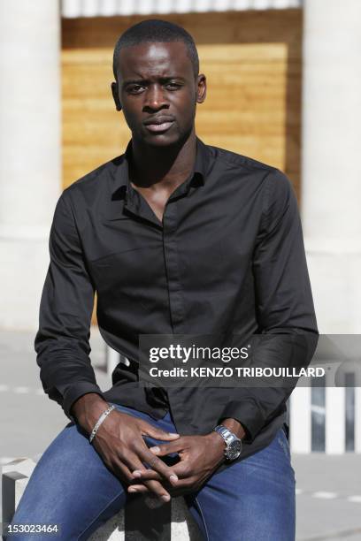 French Cameroonian-born student Jean Eyoum poses on September 29, 2012 in Paris. Eyoum wrote "super cagnotte" a street-talk version of Moliere's...