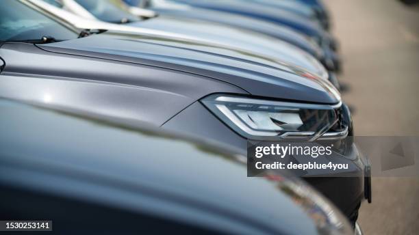 used cars parked at a public car dealership - vehicle manufacturers brand names stock pictures, royalty-free photos & images