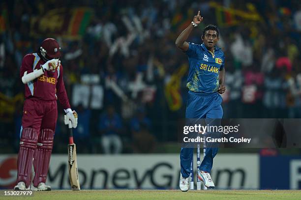 Ajantha Mendis of Sri Lanka celebrates dismissing Johnson Charles of the West Indies during the ICC World Twenty20 2012 Super Eights Group 1 match...